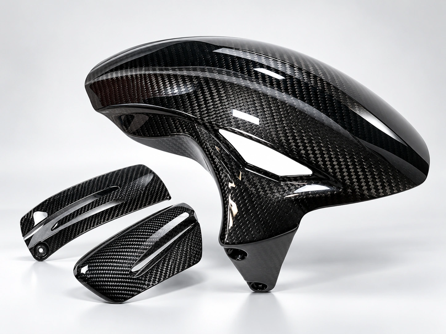 Illustrative studio image of carbon fiber motorcycle components